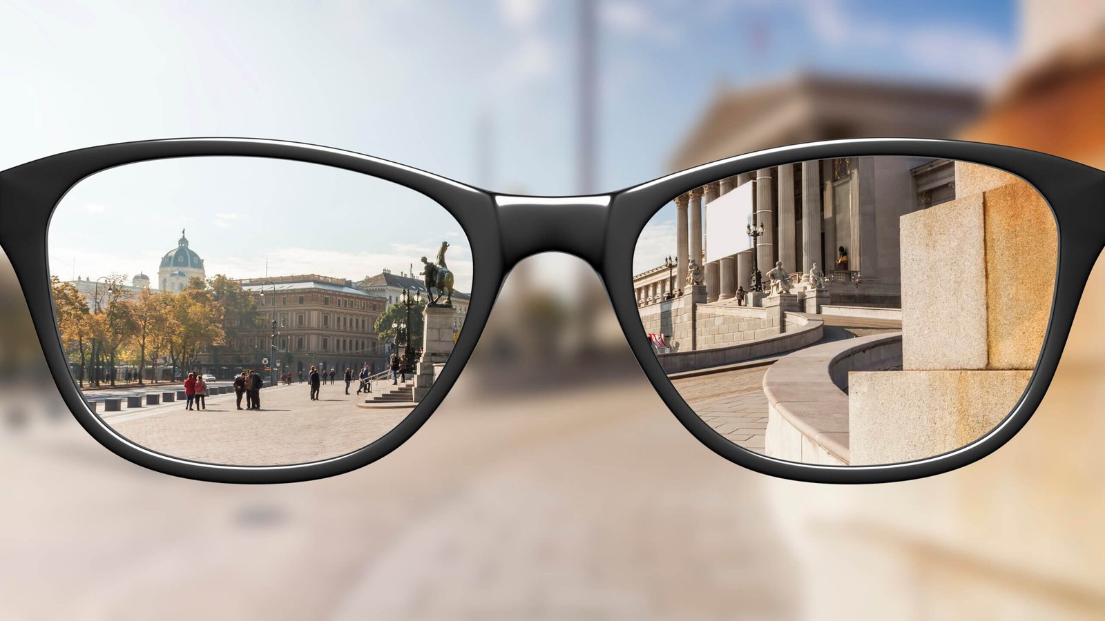 pole-ophtalmologie-colombes-la-defense lunettes corrigeant la myopie permettant de voir net le paysage flou en arrière plan